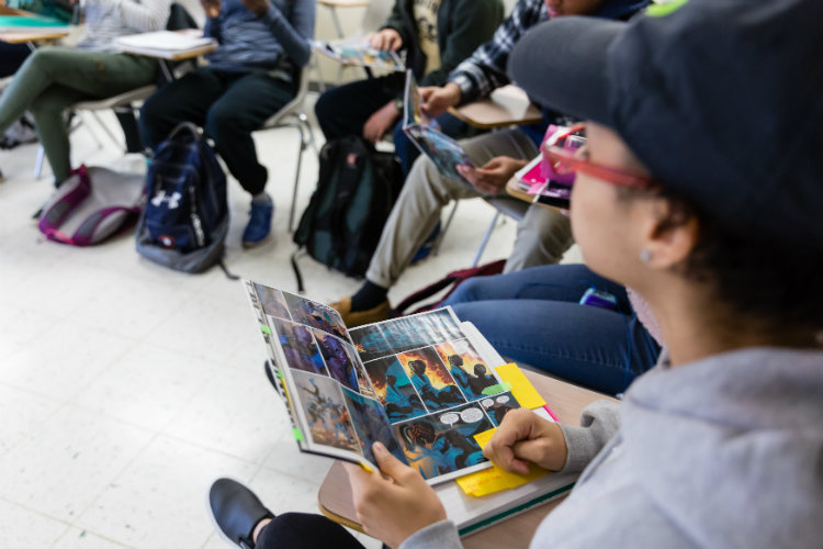  Students taking notes during McKinley Melton's first-year seminar 